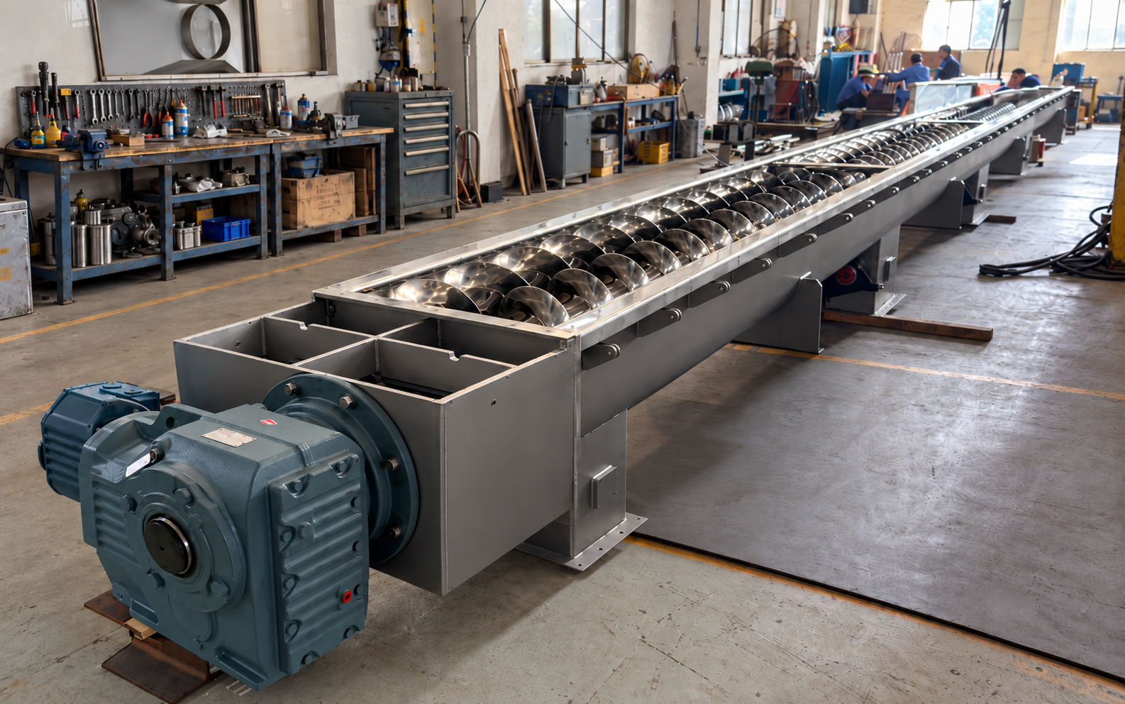 Custom screw conveyors installed as part of an industrial process system